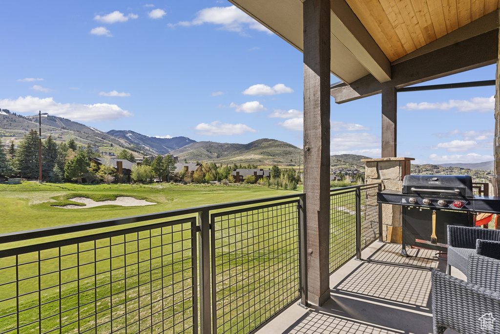 Balcony with a mountain view and a grill