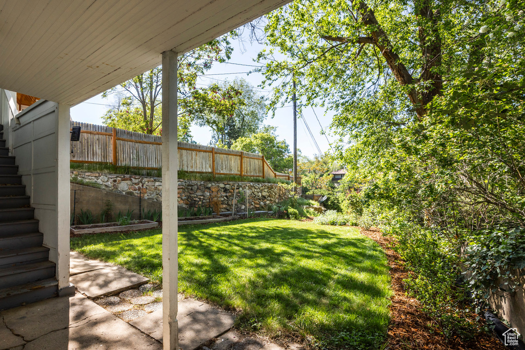 View of yard with stairway