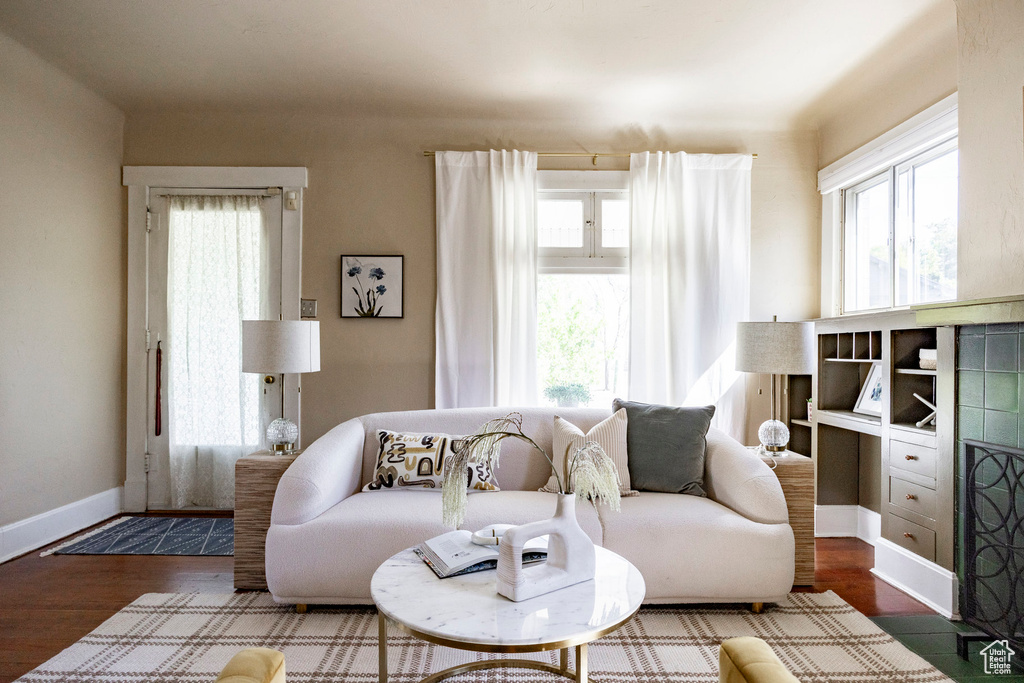 Living room featuring wood finished floors and baseboards