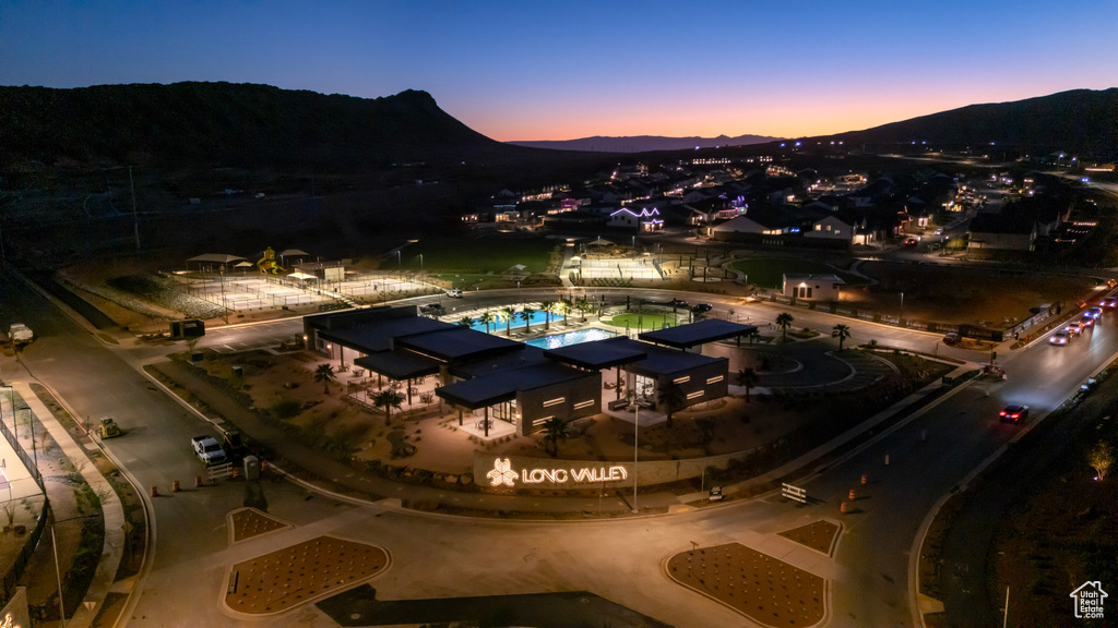 Bird's eye view of a mountain backdrop and a pool area
