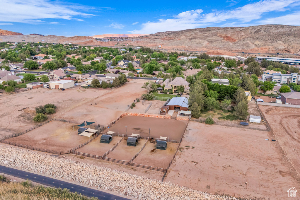 Aerial view of residential area featuring a mountain backdrop