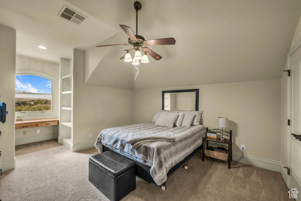 Carpeted bedroom with baseboards, lofted ceiling, ceiling fan, and recessed lighting