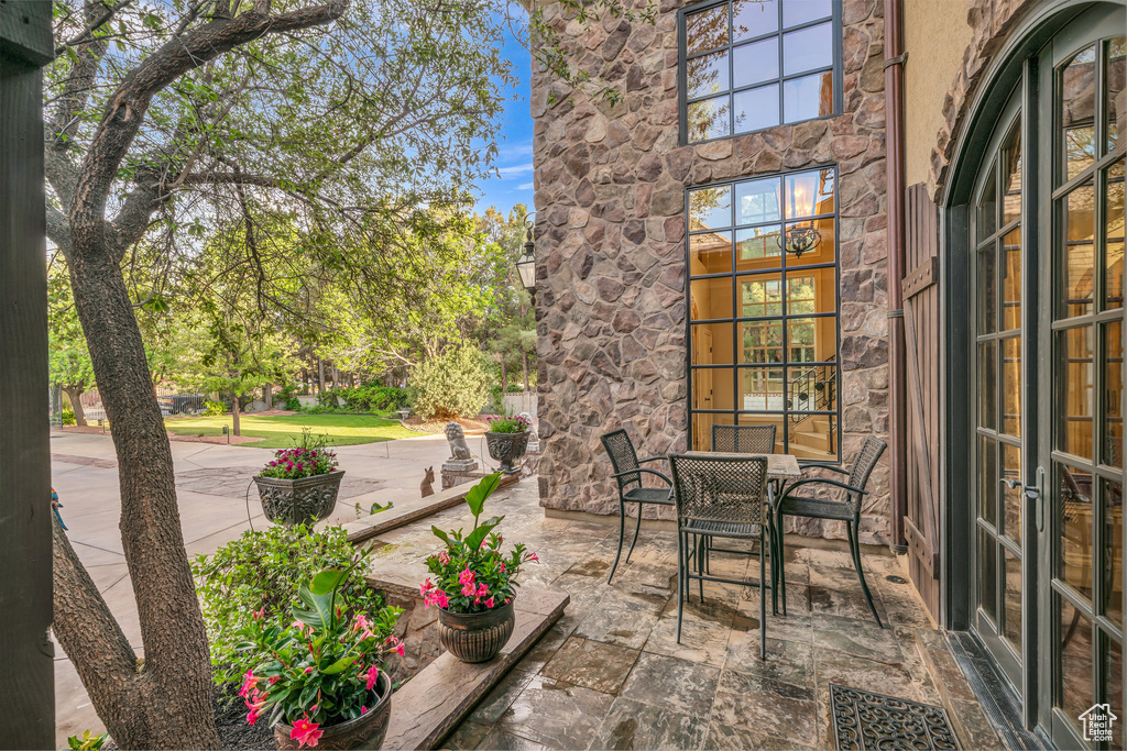 View of patio / terrace featuring outdoor dining space and french doors