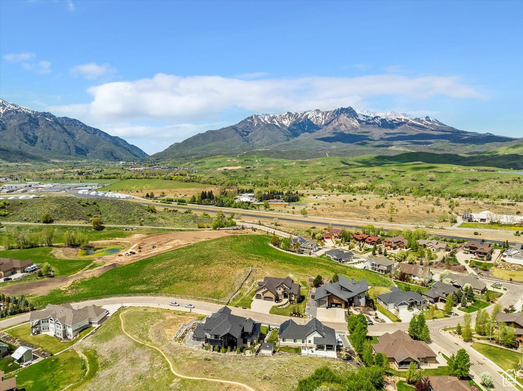 Aerial view of residential area featuring mountains