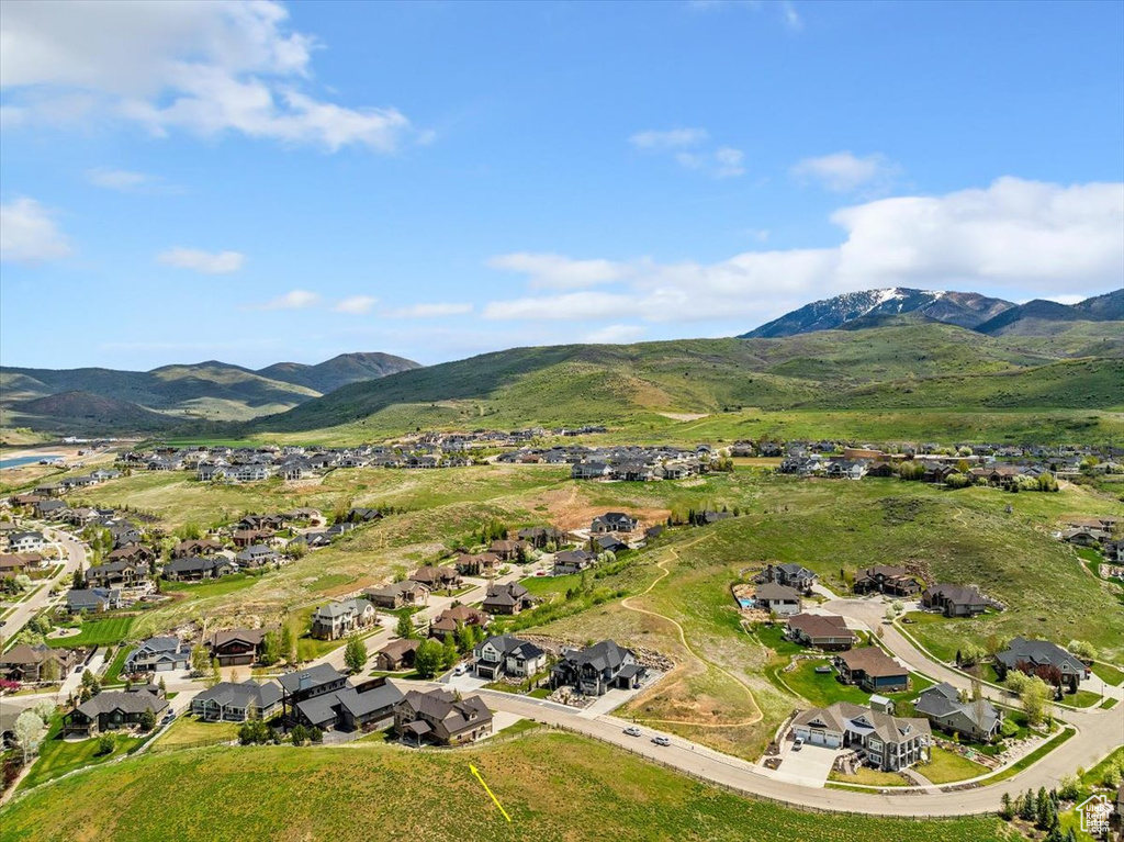 Aerial overview of property\\\'s location with nearby suburban area and mountains
