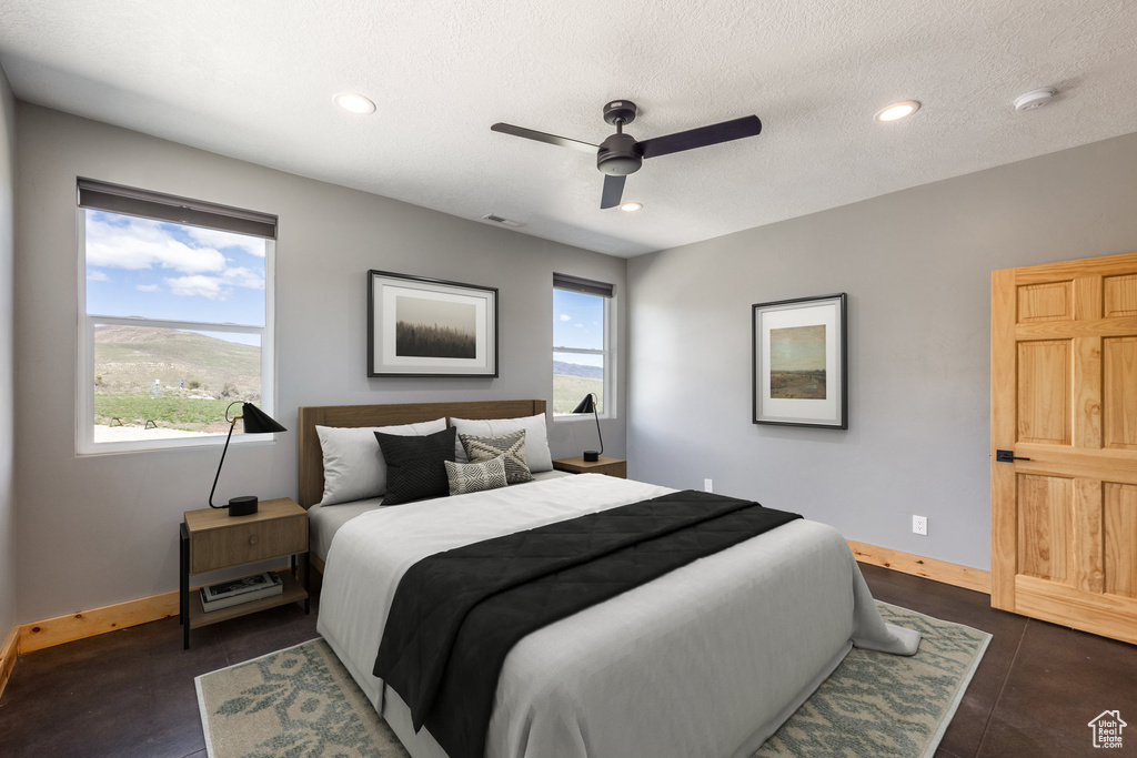 Bedroom with baseboards, recessed lighting, and ceiling fan