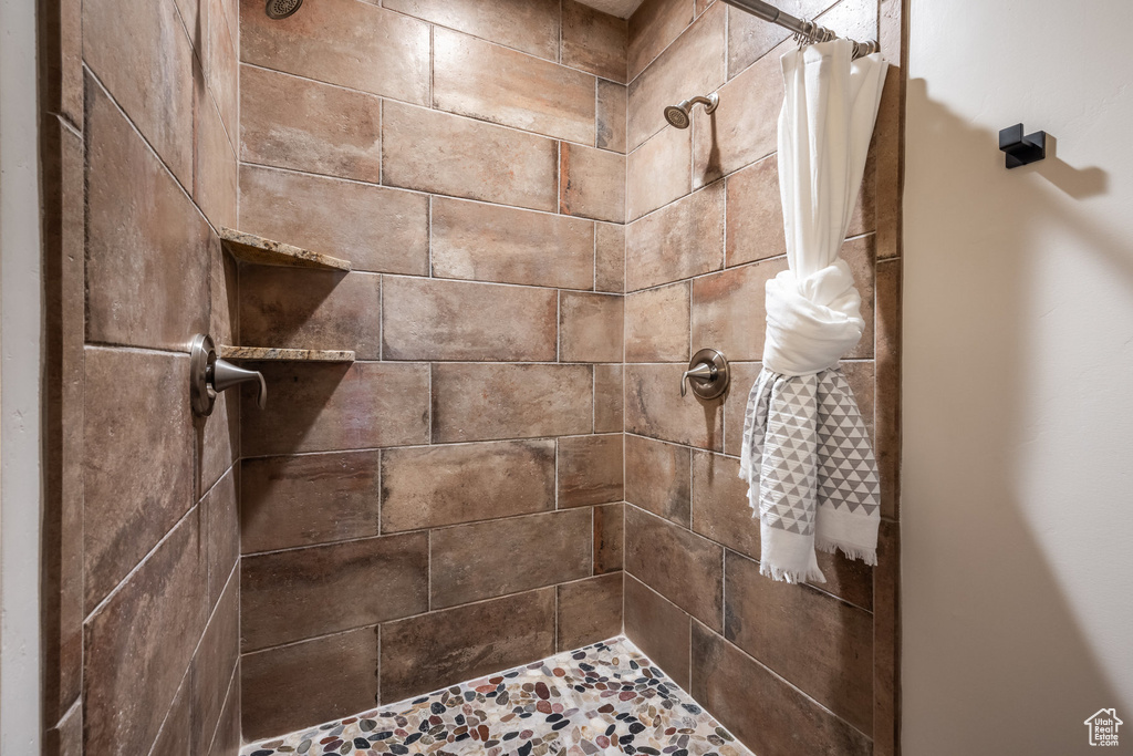 Bathroom with a tile shower
