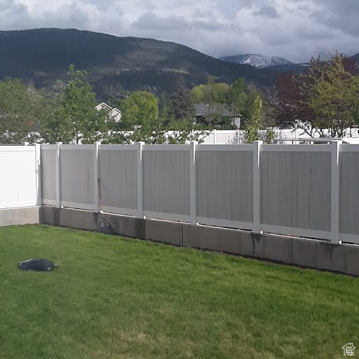 View of yard with a mountain view