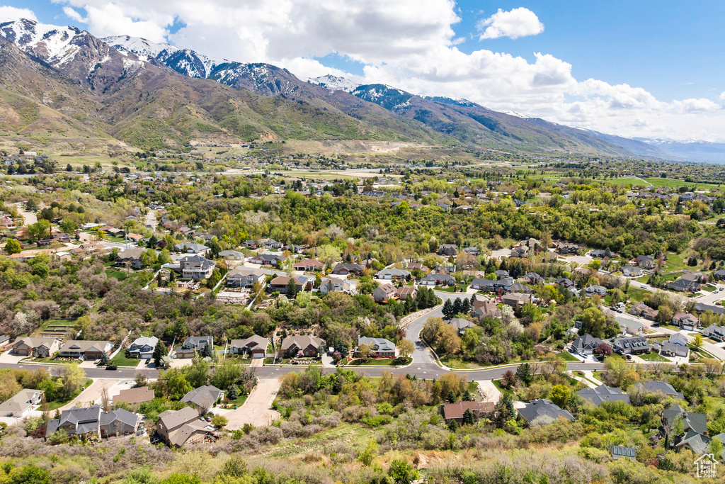 Aerial perspective of suburban area featuring mountains