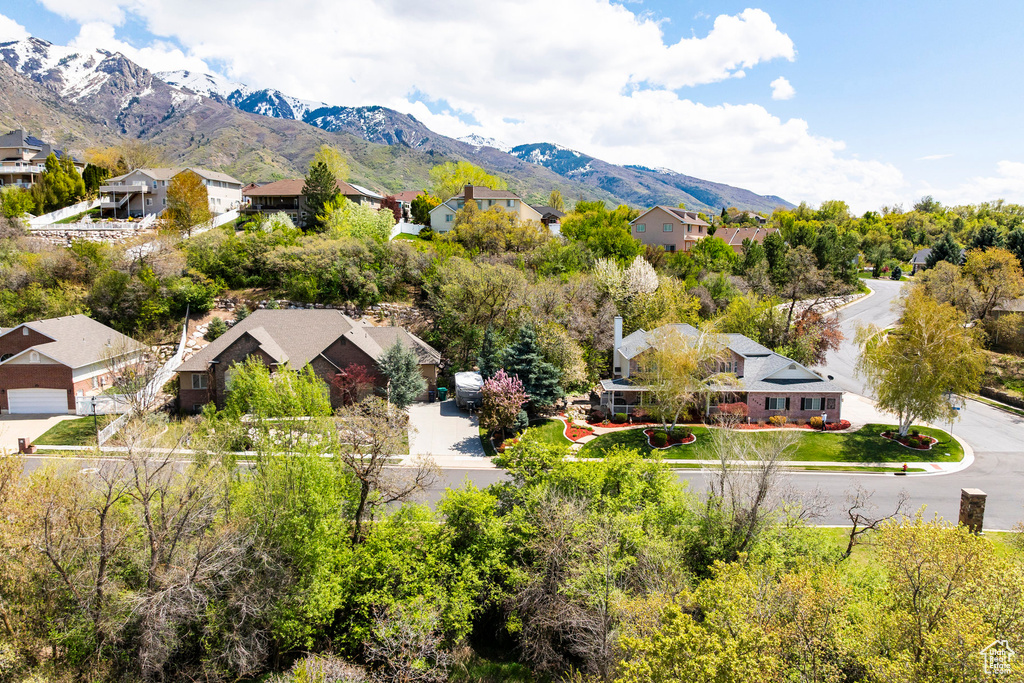 Aerial view of residential area with a mountain backdrop