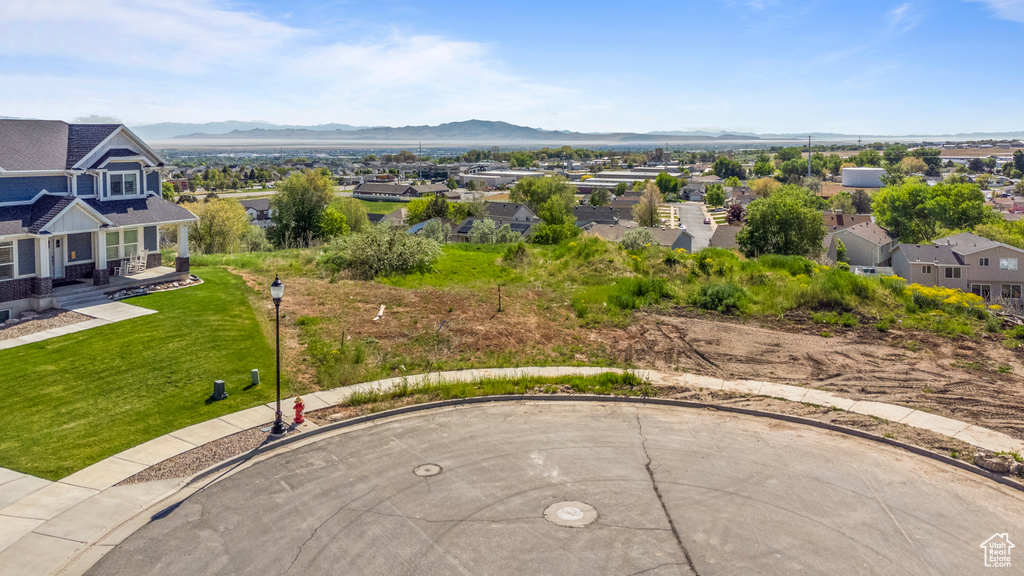 Surrounding community featuring a residential view and a mountain view