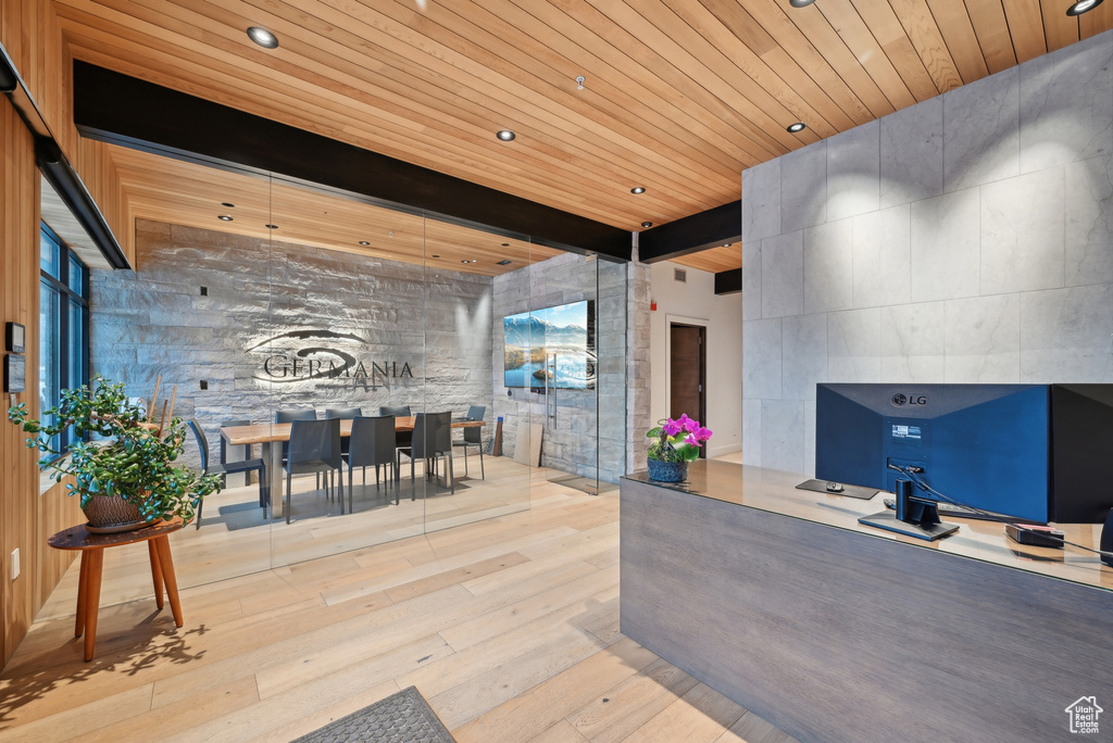 Reception area featuring wooden ceiling, recessed lighting, and beam ceiling