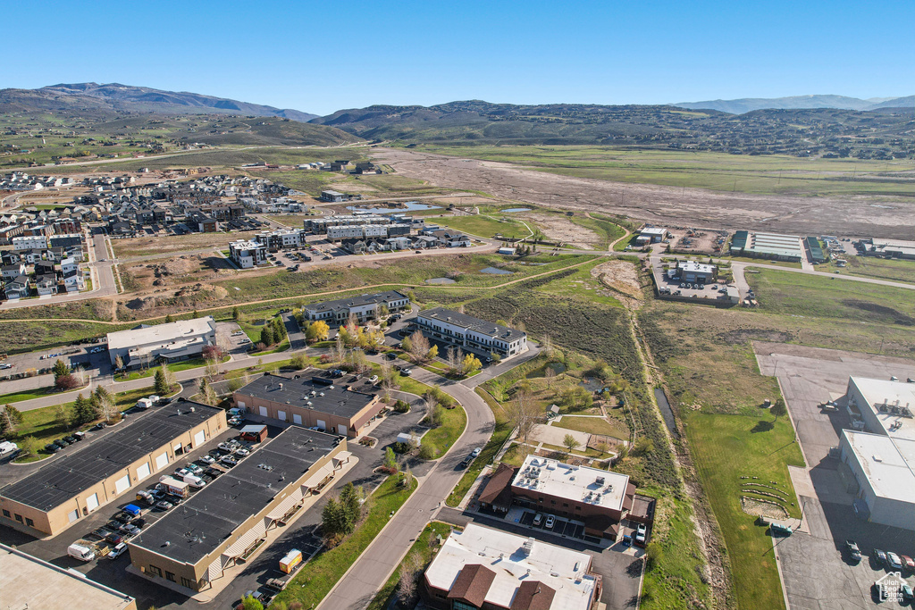 Aerial overview of property's location with a mountain backdrop