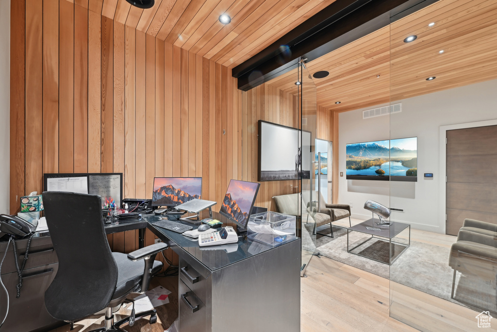 Home office featuring wood finished floors, recessed lighting, wooden ceiling, and wooden walls