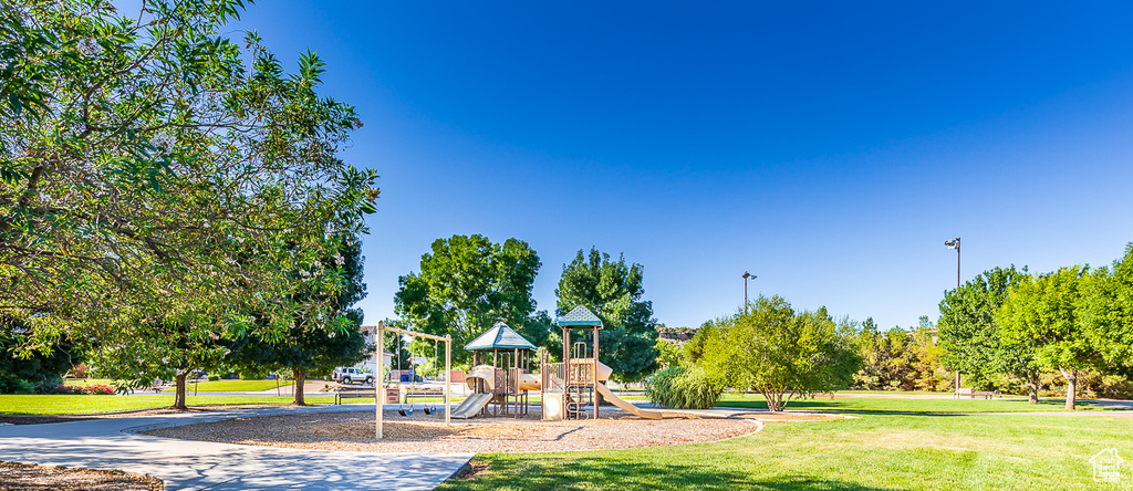 Community playground featuring a lawn