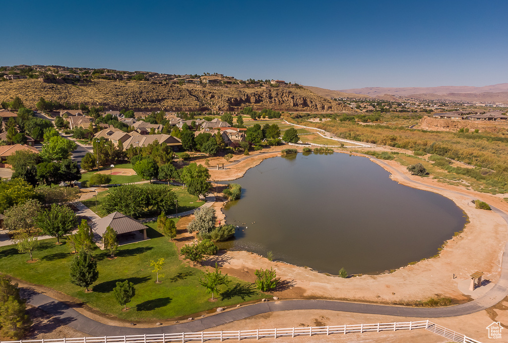 Aerial perspective of suburban area with a water and mountain view