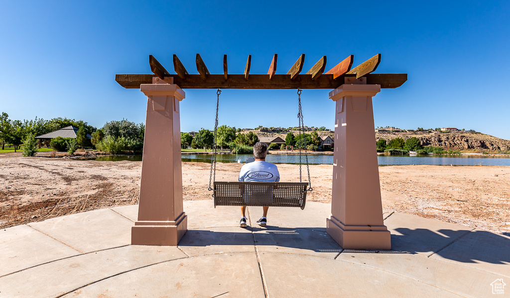 View of patio / terrace featuring a water view