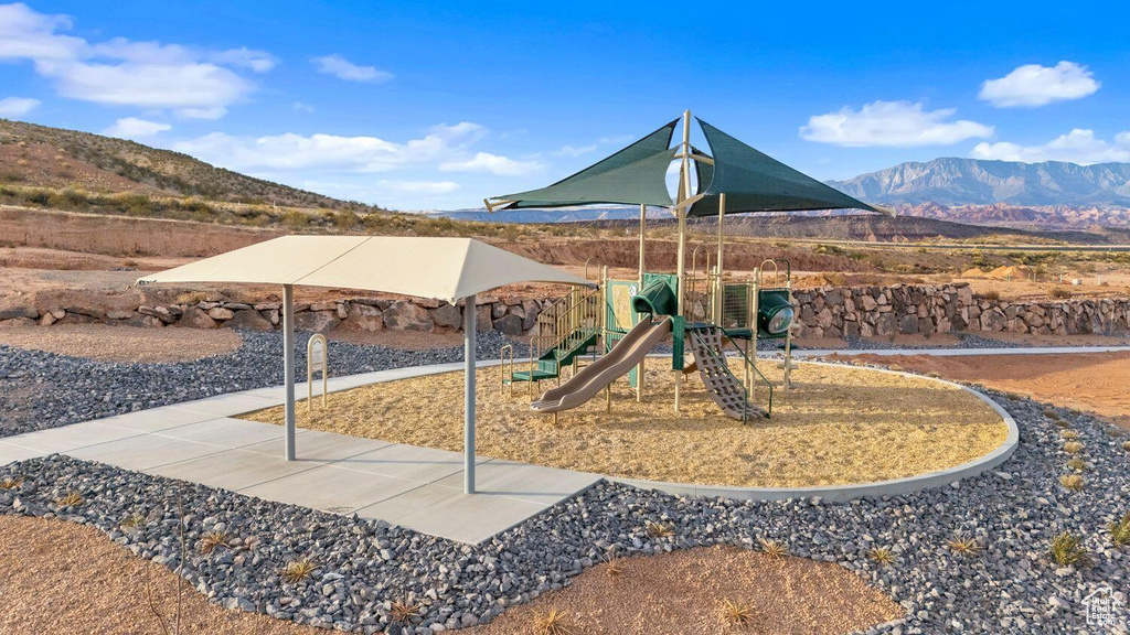Community playground with a mountain view
