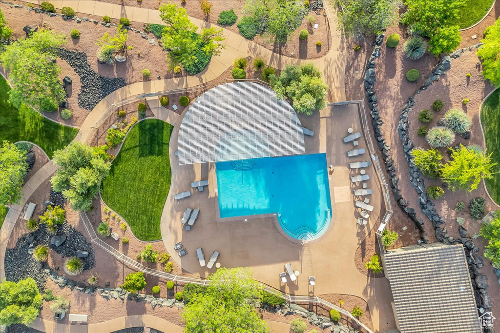 Aerial view of property's location with a pool
