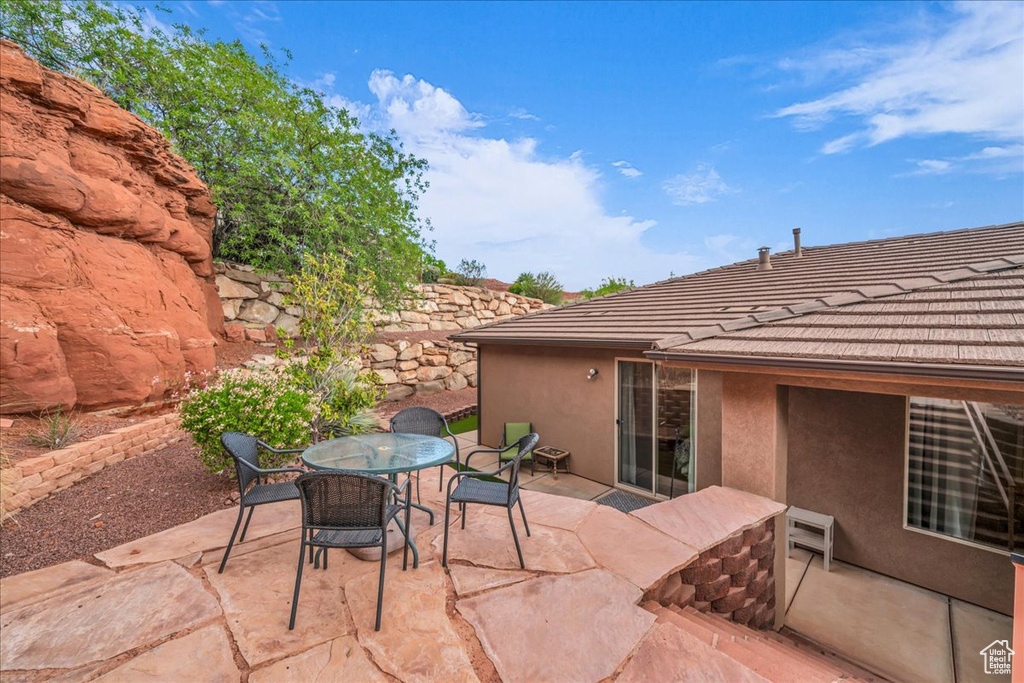 View of patio featuring outdoor dining area