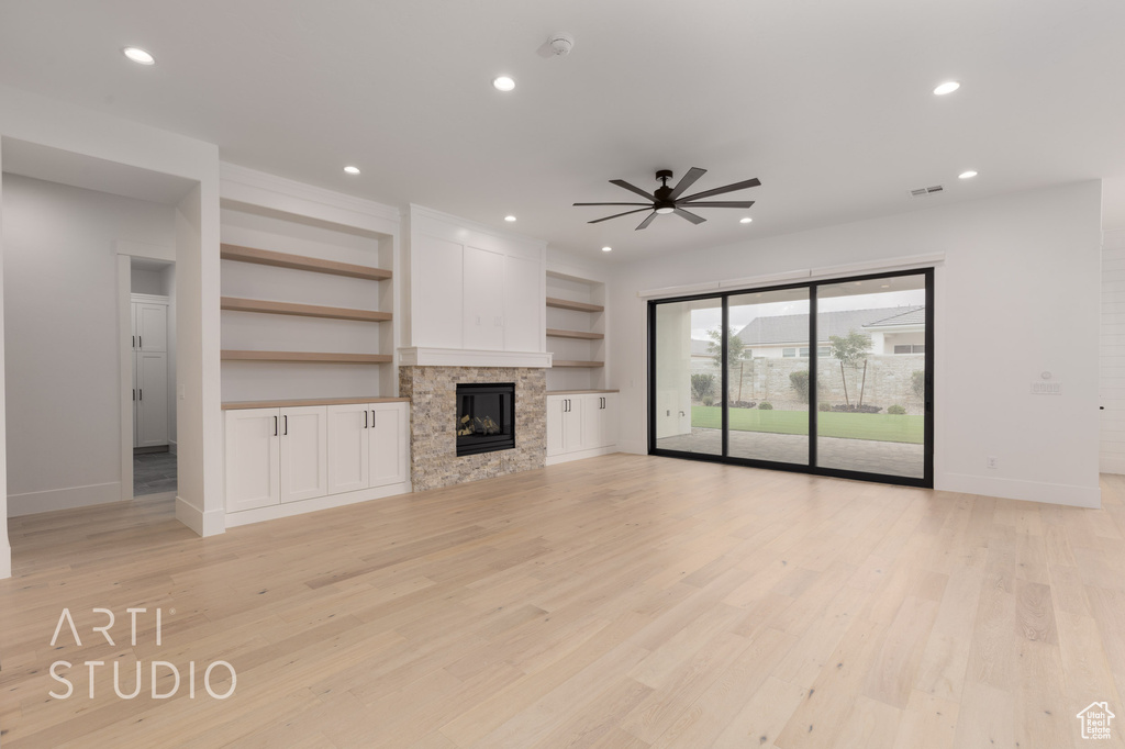 Unfurnished living room with baseboards, ceiling fan, light wood-type flooring, and recessed lighting