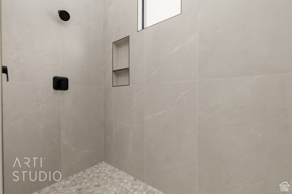 Bathroom with a tile shower
