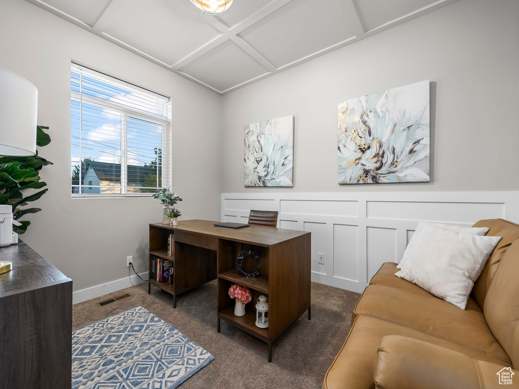 Office space with dark colored carpet
