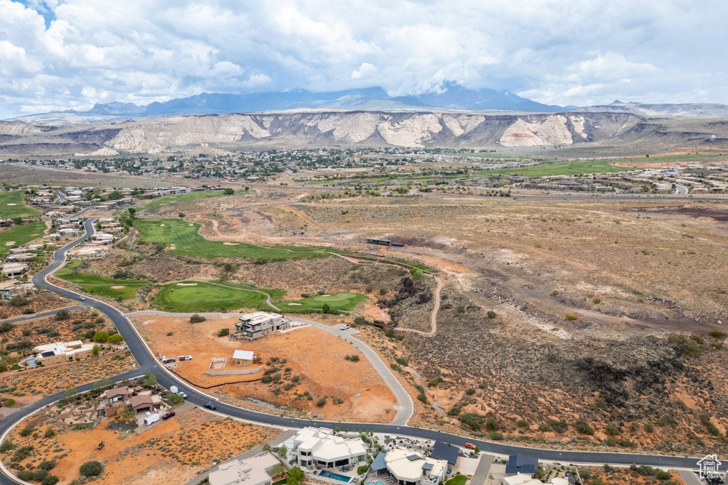 Aerial view of property's location featuring mountains