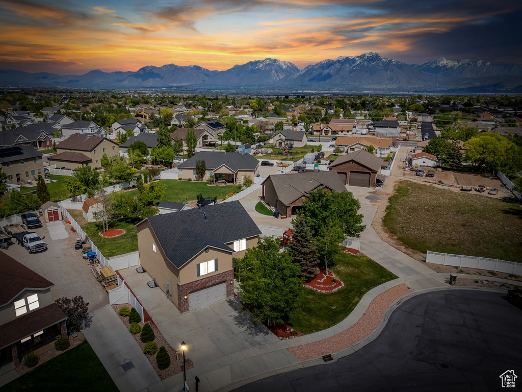 Aerial view at dusk of a mountain view and a residential view