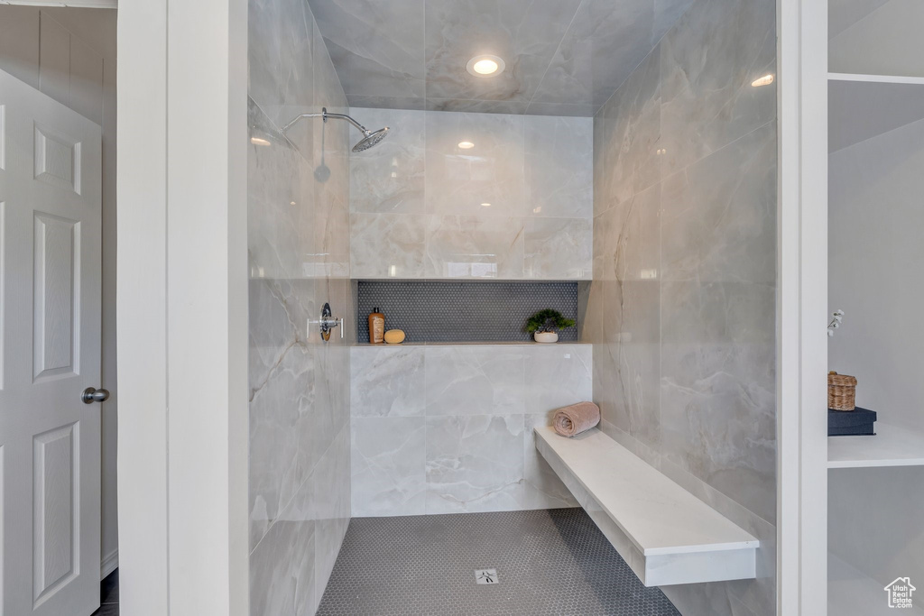 Full bathroom with a tile shower