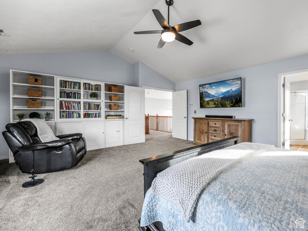 Bedroom featuring carpet, high vaulted ceiling, a ceiling fan, and ensuite bathroom