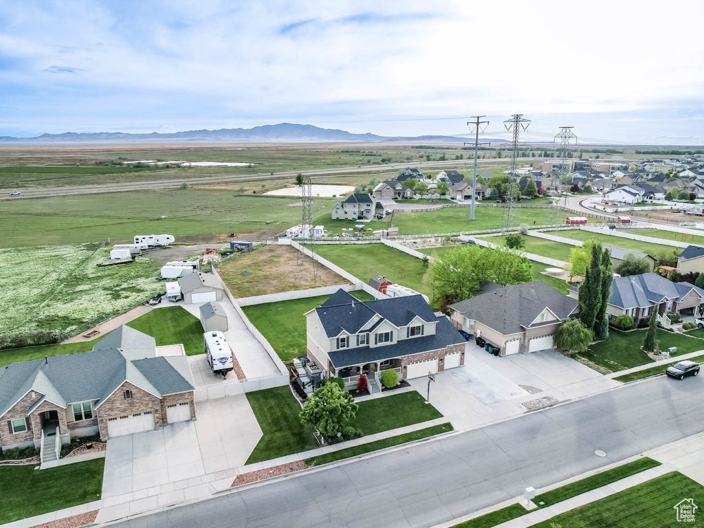 Aerial view of residential area with mountains