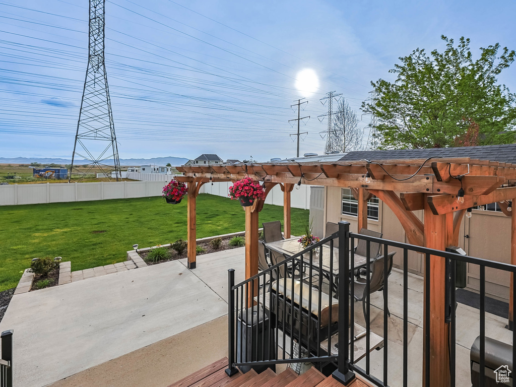 View of patio / terrace with outdoor dining space and a pergola