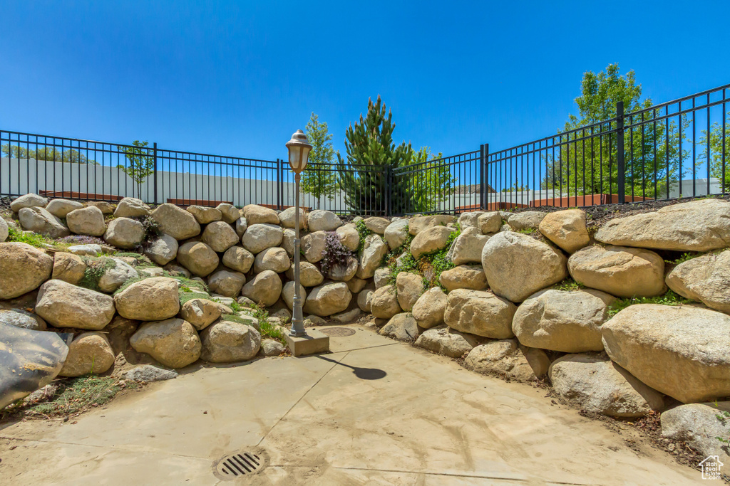 View of property\\\'s community featuring fence