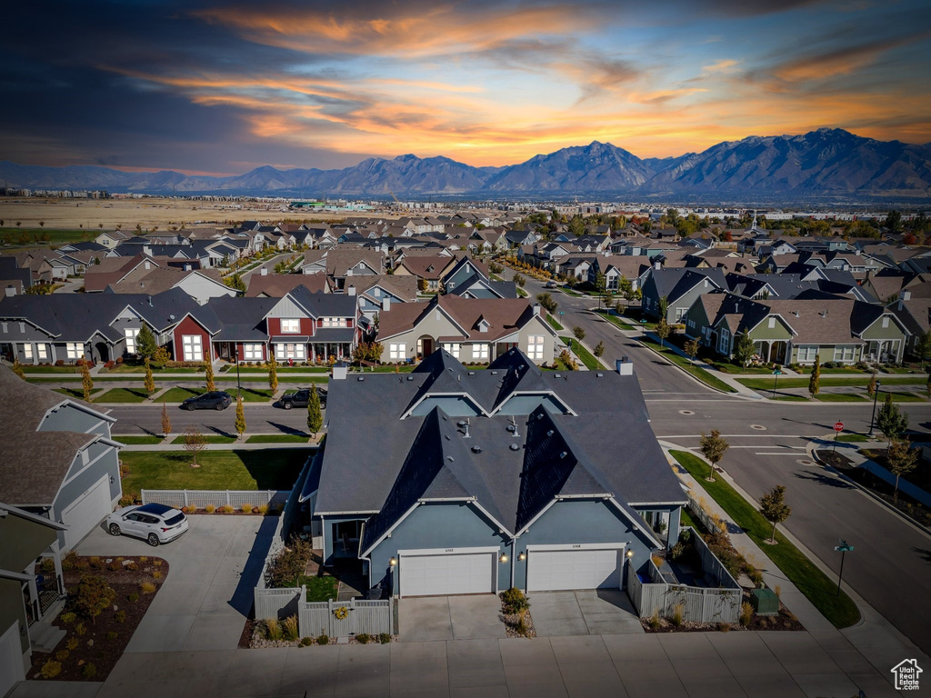 Aerial perspective of suburban area with mountains