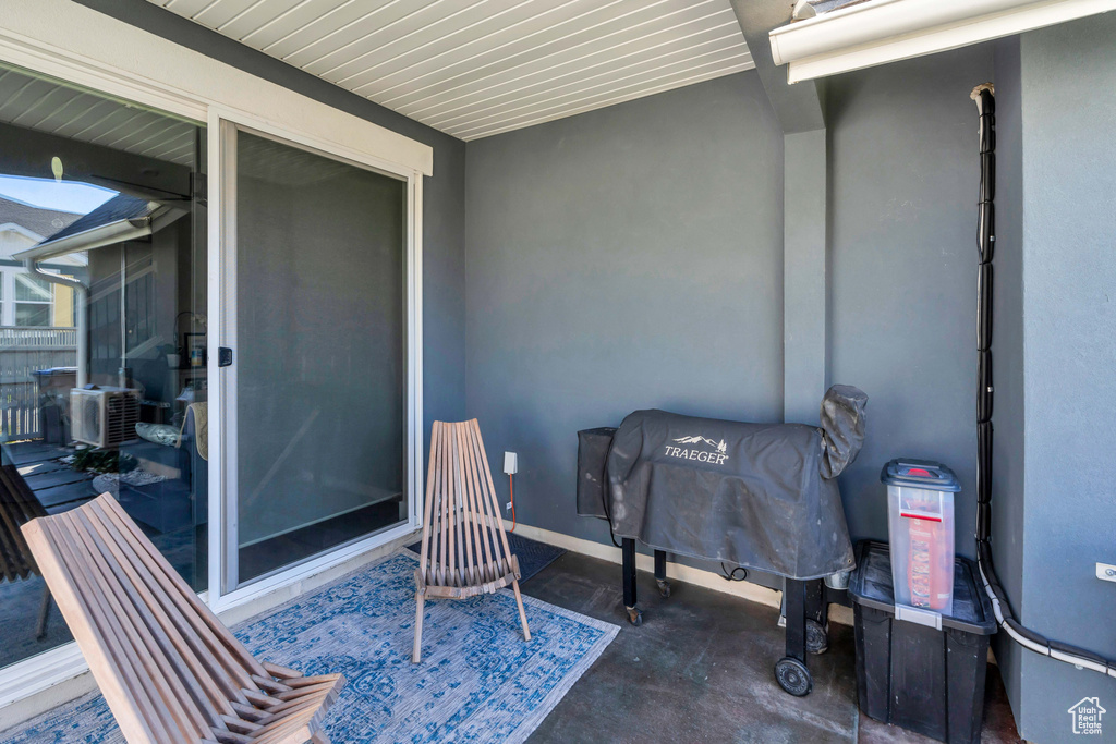 View of patio / terrace featuring cooling unit