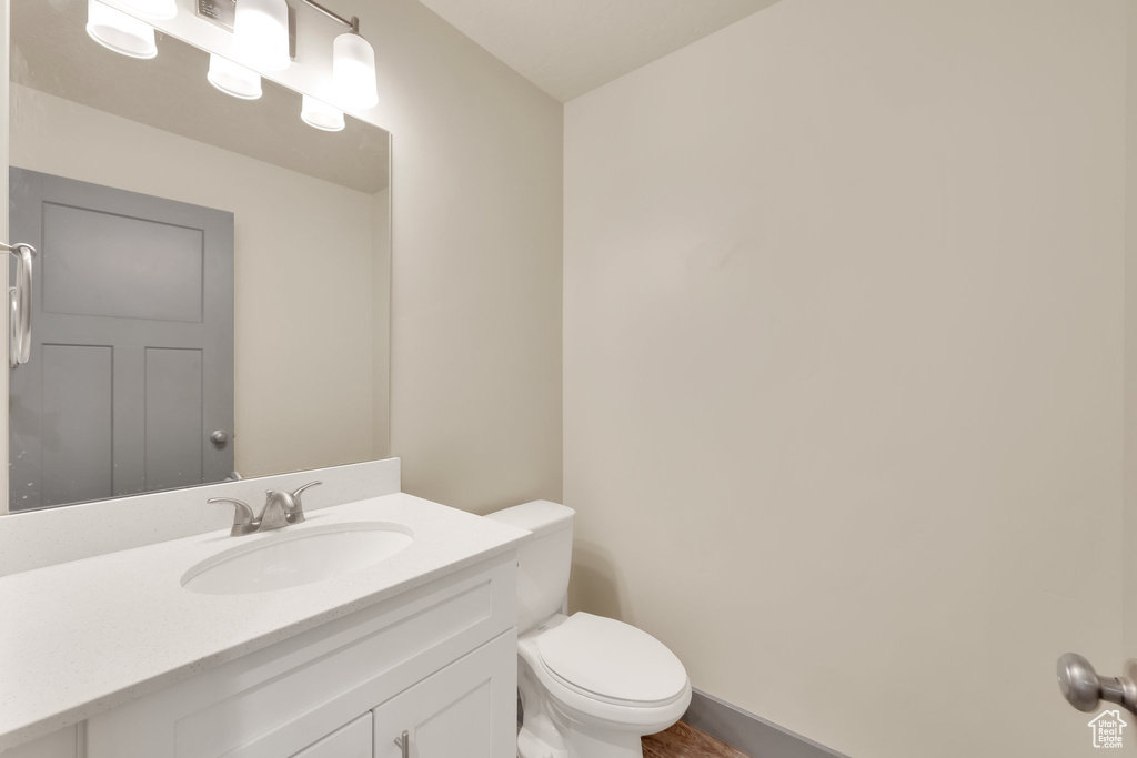 Half bath with toilet and vanity