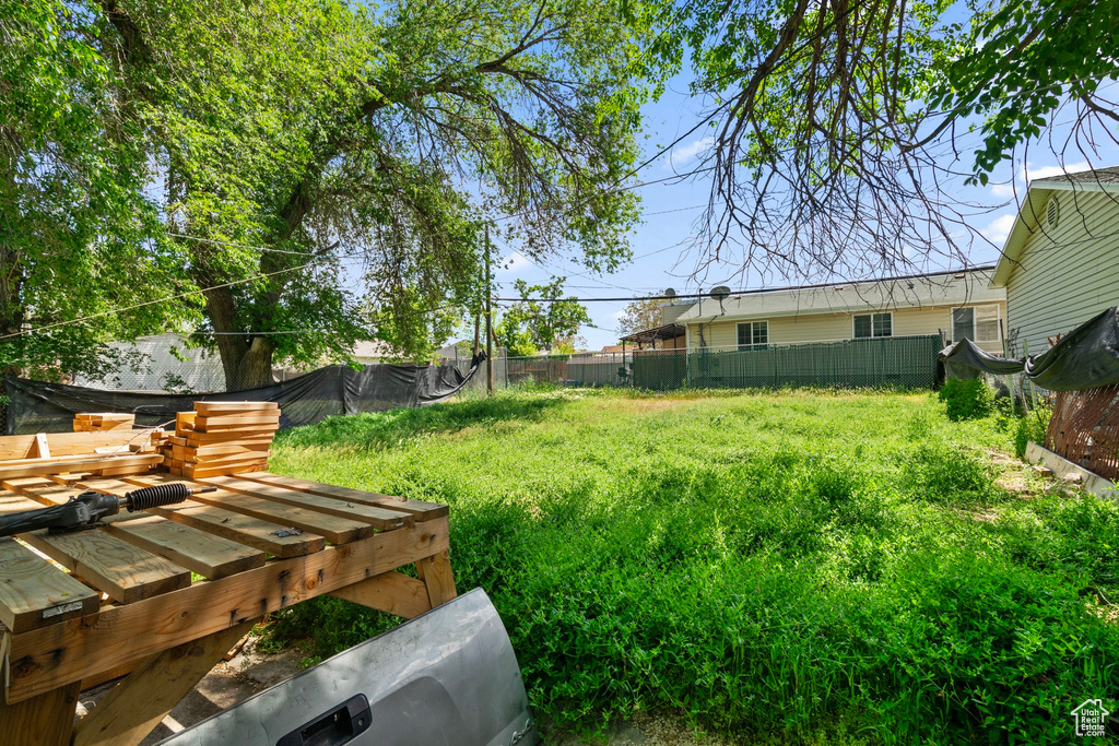 View of yard with fence