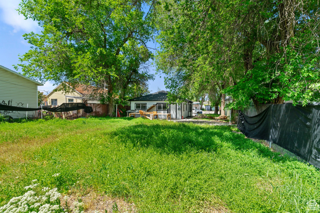 View of yard with fence