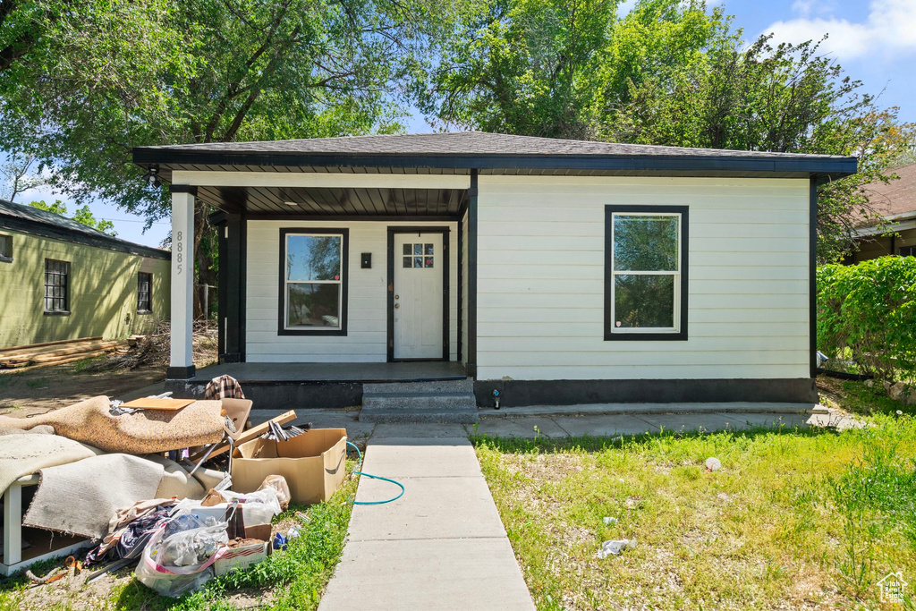 View of front of home featuring covered porch