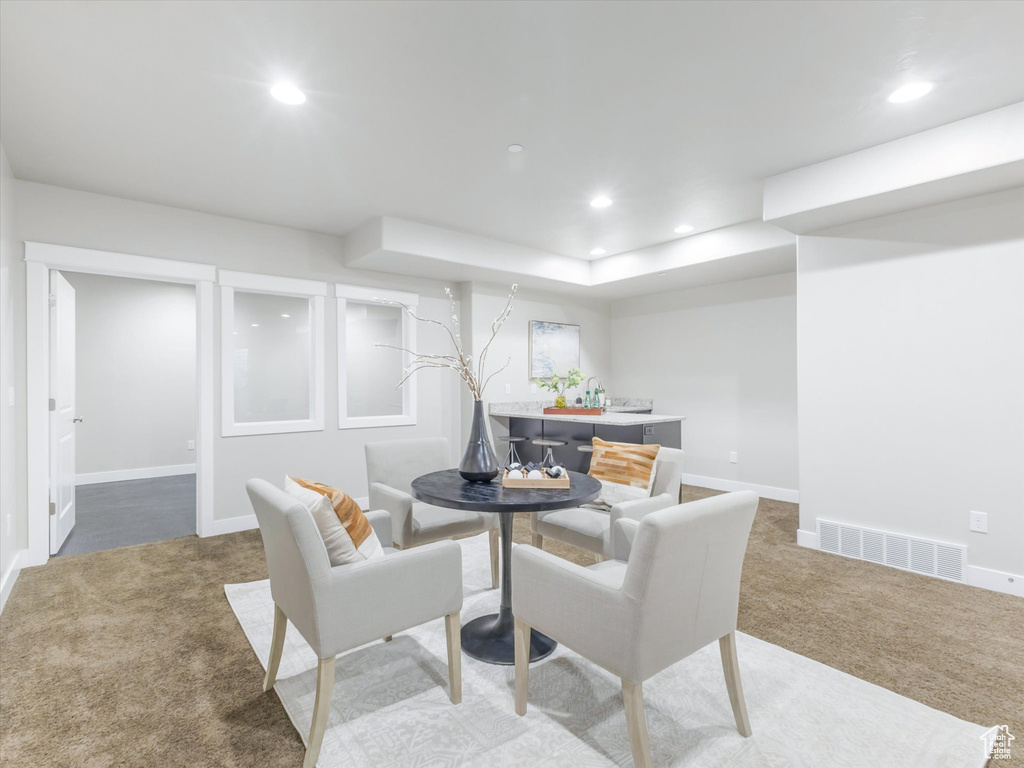 Dining space featuring carpet flooring, recessed lighting, and baseboards