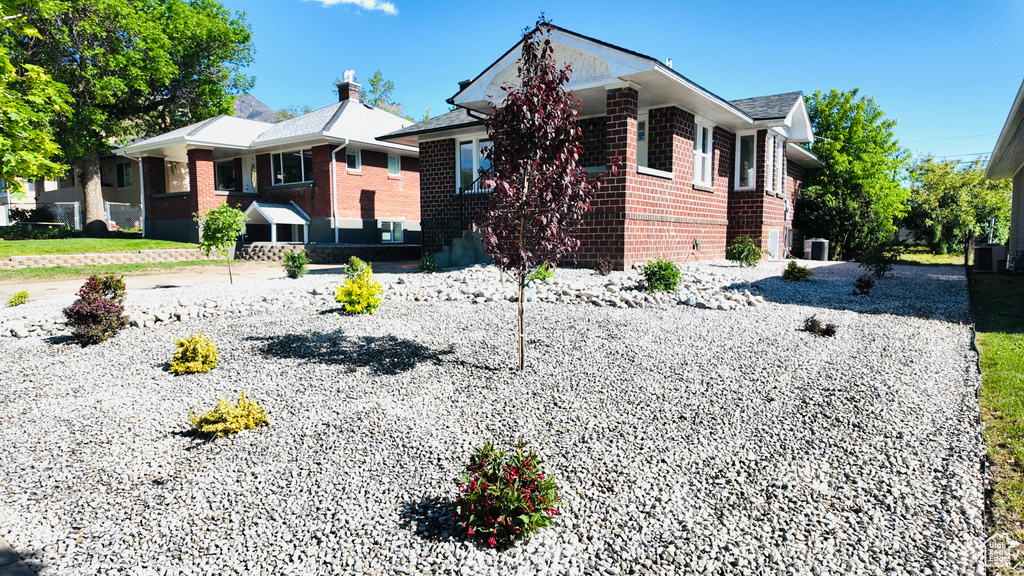 View of front of home with brick siding