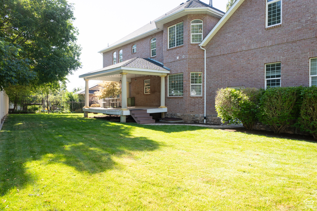 Back of property with brick siding