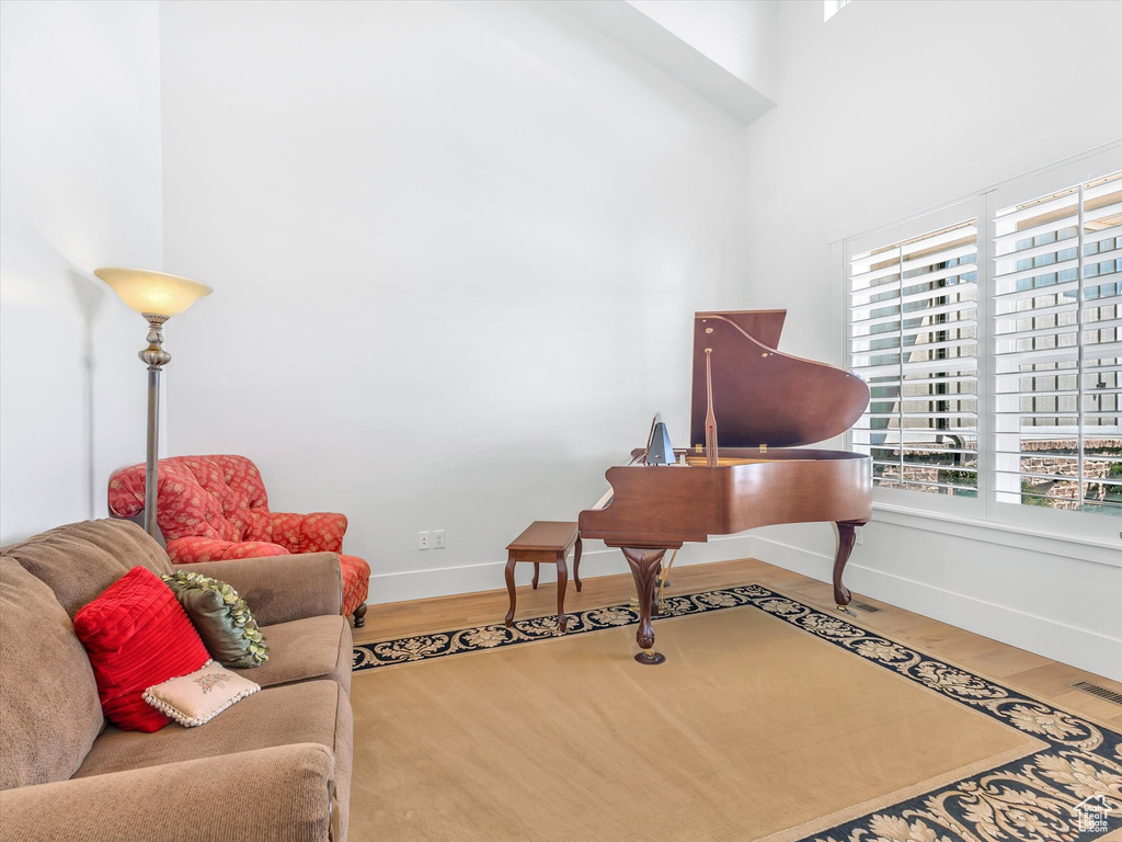 Office space featuring wood finished floors and baseboards