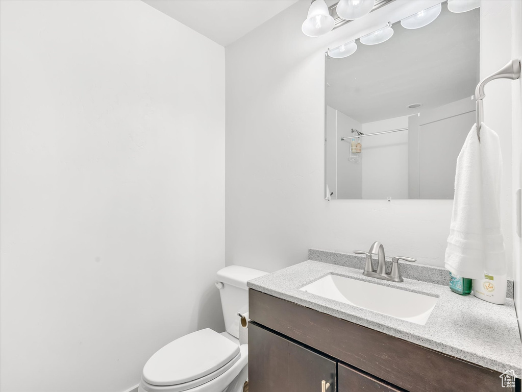 Bathroom with toilet and vanity