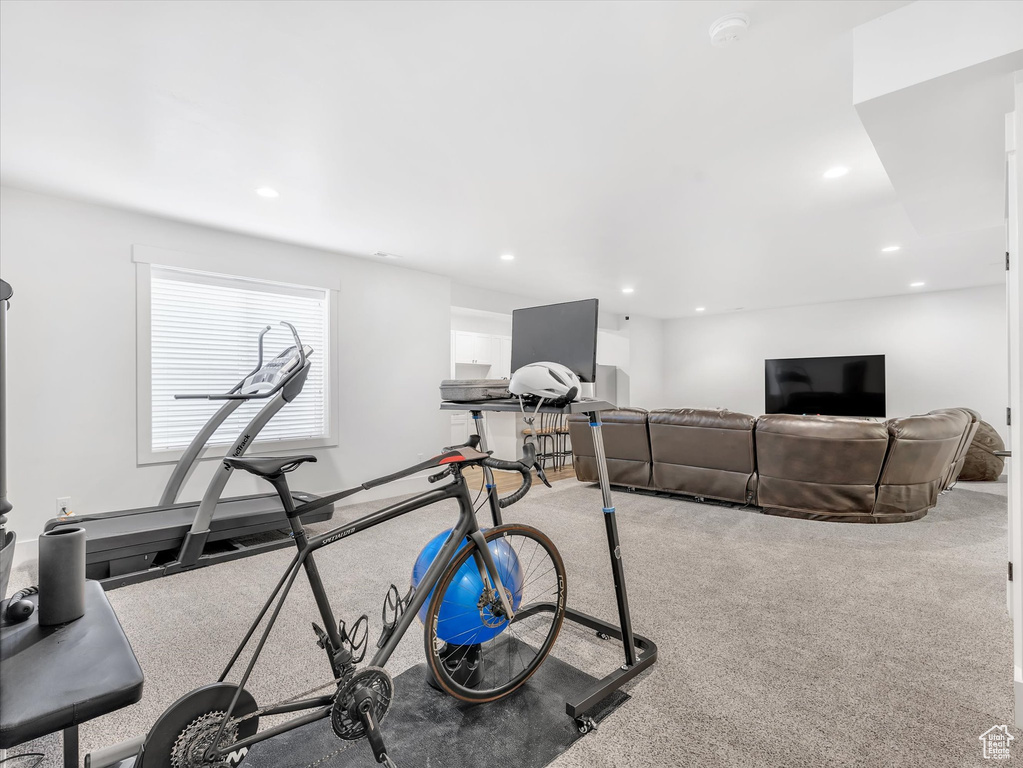 Workout room with recessed lighting and carpet flooring