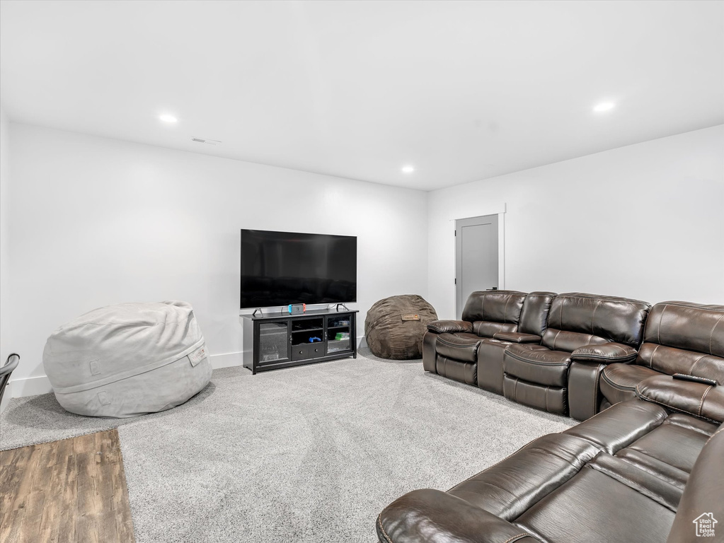 Living room featuring recessed lighting and baseboards