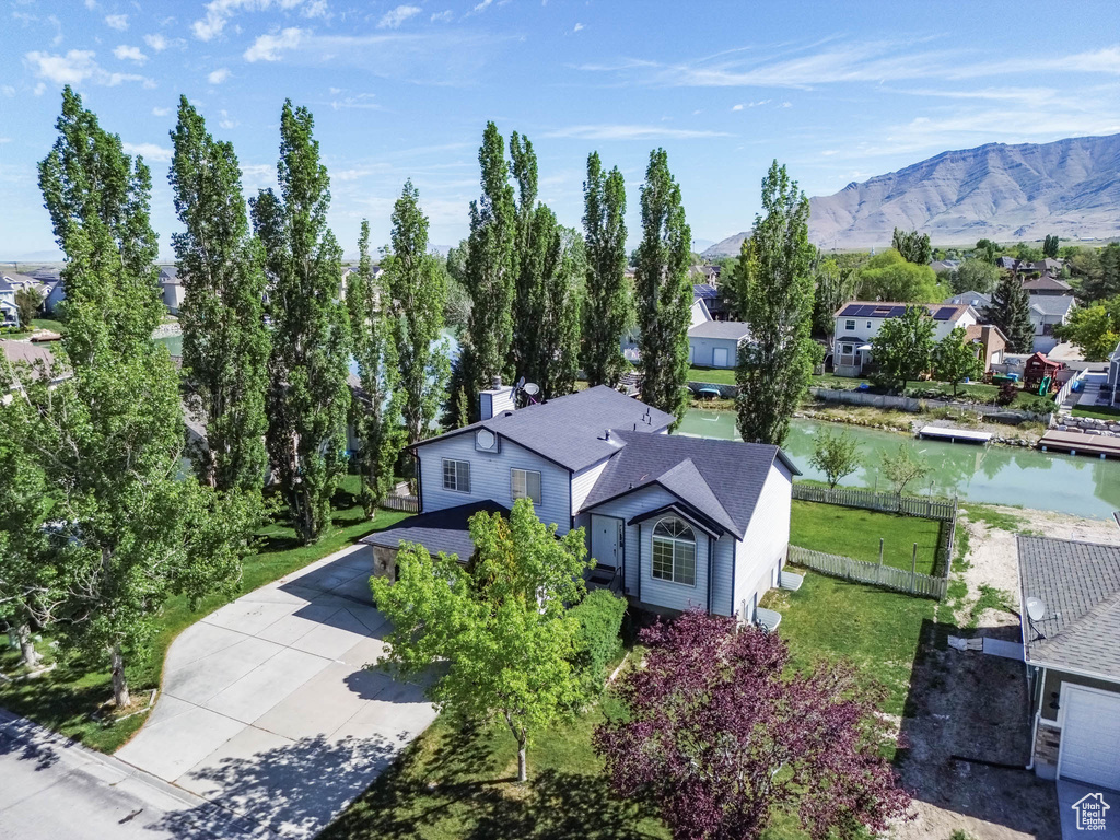 View from above of property featuring a water and mountain view