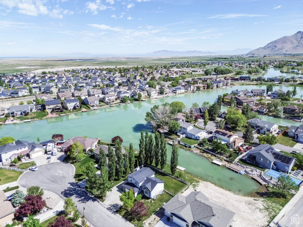 View of property location with nearby suburban area and a water and mountain view