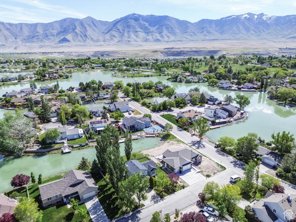 Aerial view of residential area with a water and mountain view